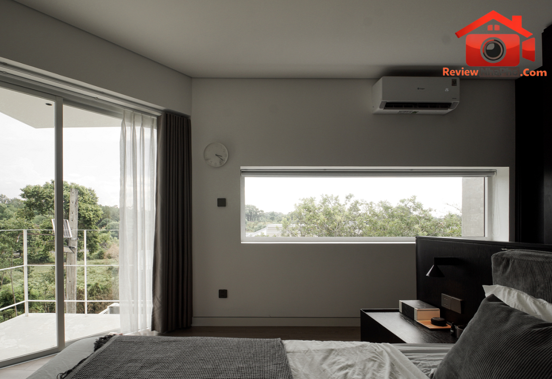 Nhà hướng Tây 102m² tại Huế: Lõi cầu thang mặt tiền và vật liệu bản địa làm mát tự nhiên- Ảnh 17. Nhà hướng Tây 102m² tại Huế: Lõi cầu thang mặt tiền và vật liệu bản địa làm mát tự nhiên- Ảnh 17.