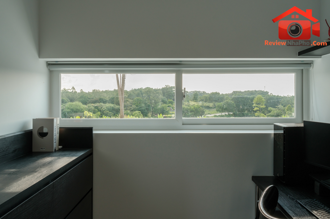 Nhà hướng Tây 102m² tại Huế: Lõi cầu thang mặt tiền và vật liệu bản địa làm mát tự nhiên- Ảnh 18. Nhà hướng Tây 102m² tại Huế: Lõi cầu thang mặt tiền và vật liệu bản địa làm mát tự nhiên- Ảnh 18.