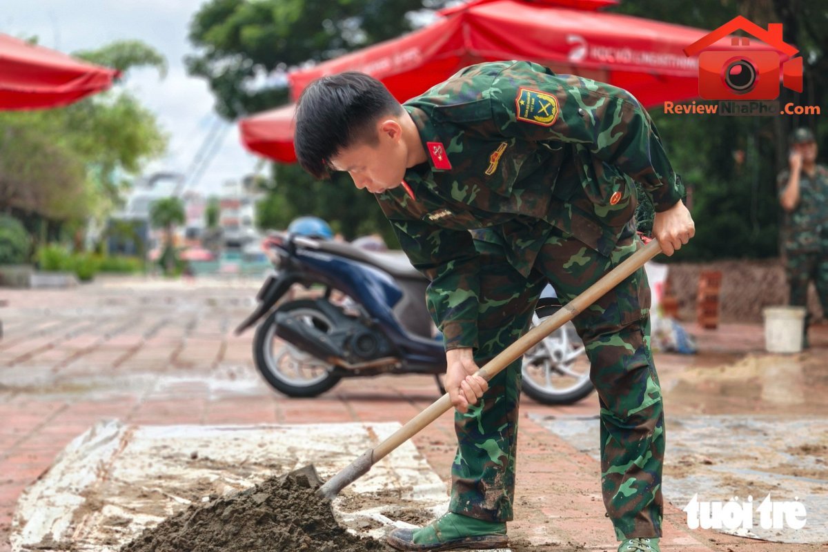 Khẩn trương chuẩn bị lễ truy điệu, an táng hài cốt liệt sĩ ở công viên Lê Thị Riêng - Ảnh 7.