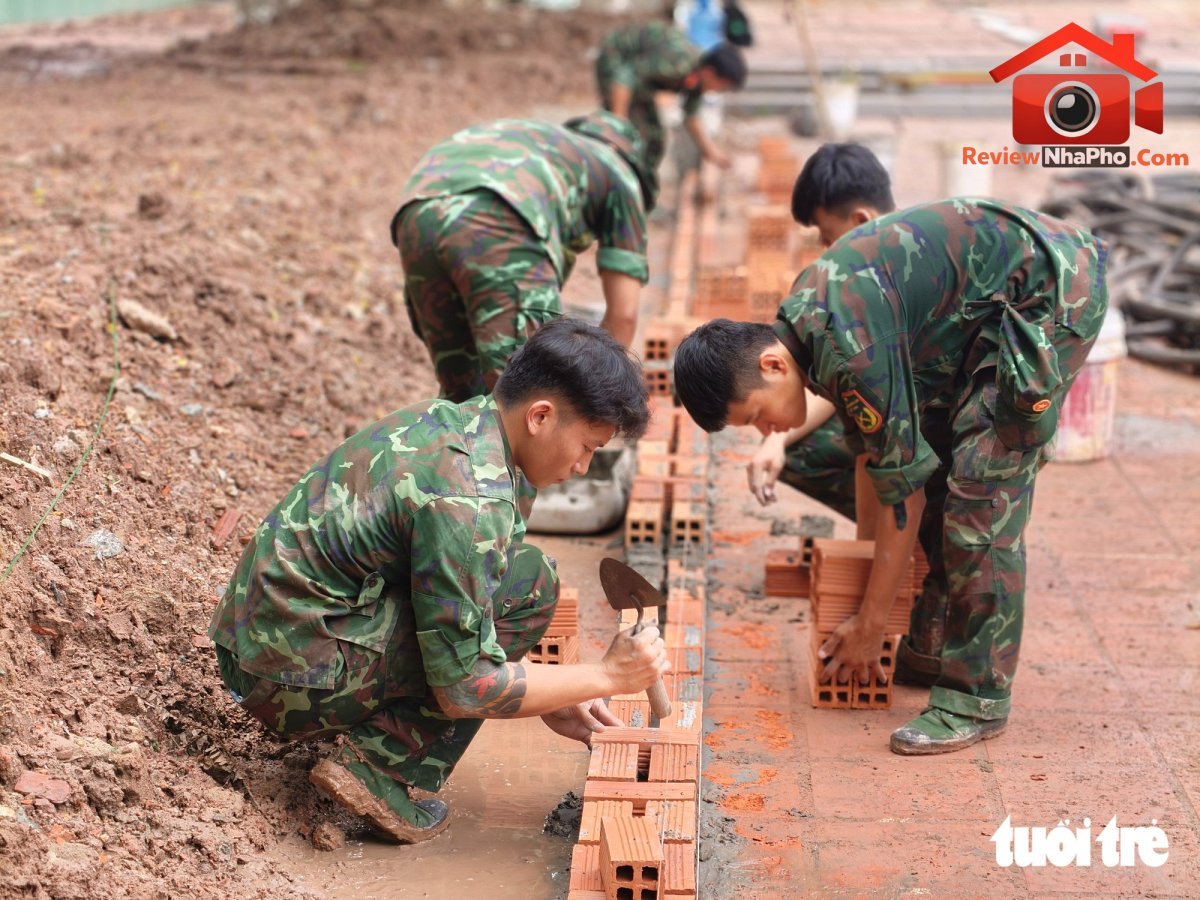 Khẩn trương chuẩn bị lễ truy điệu, an táng hài cốt liệt sĩ ở công viên Lê Thị Riêng - Ảnh 1.
